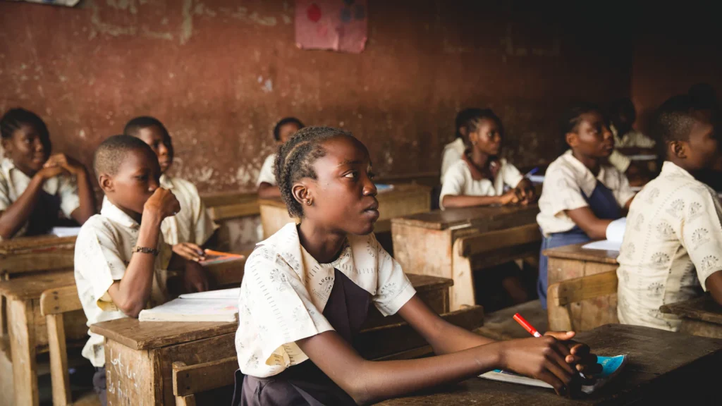 Children seated in a classroom